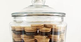 Cookie-Jar In the warm and cozy kitchen, the familiar of the cookie jar being opened and closed can be heard. The gentle