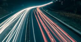 Nighttime-Traffic The of nighttime traffic are a symphony of urban life. The low hum of passing cars creates a steady