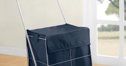 Durable shopping cart with a navy fabric lining, designed for easy transport of groceries and essentials on wheels.