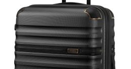 Suitcase The of clothes being packed in a suitcase is a medley of rustling fabrics and gentle thuds as each garment is