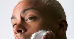 Shaving The Shave captures the intimate details of a person running a razor over their skin, the sharp blade catching