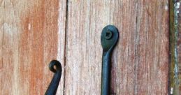 Hooks The of rusty hooks creaking and groaning as they are pulled from the dusty shelves in the old tool shed is a