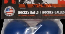 Hockey-Ball The of a bouncing hockey ball echoes through the arena, the sharp "thud" of the ball reverberating off the