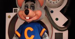 Chuck E. Cheese mascot in a blue shirt and shorts, ready for fun at a family-friendly arcade and pizza restaurant.