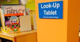 Look-Up Tablet at Gush Library, providing easy access to catalog and services for patrons. Press blue button to begin.