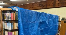 Dry tarp Library The of "Fabric Tarp Swish Dry, Fabric Tarp Swish Dry" fill the air in the Dry Tarp S Library, creating a