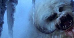 Fierce Wampa monster from Star Wars battles in a snowy landscape, showcasing its icy habitat and intimidating presence.