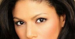 Merle Dandridge as Alyx Vance, showcasing her captivating gaze and elegant features with flowing dark hair.