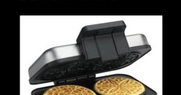 Cuisinart waffle maker with golden waffles and fresh berries, perfect for delicious breakfast ideas and culinary inspiration.