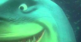 Bruce the Shark from Finding Nemo grins underwater, showcasing his sharp teeth and playful personality. Jess Harnell's voice.