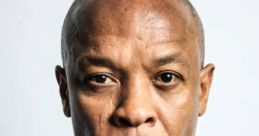 Dr. Dre, iconic rapper and producer, exuding confidence and charisma in a close-up portrait.