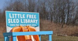 Little Free Sled Library with colorful sleds for community fun, encouraging sharing and outdoor activities during winter.