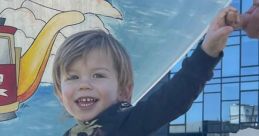 Smiling child in a black shirt reaches out joyfully, with colorful mural and modern setting in the background.