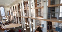 Wales Library The of Daniel Owenuare in Mold, North Wales, fill the air on a bustling Saturday morning. The mixture of