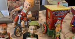 Antique toys Library The first that wafts through the air is the delicate melody of a box playing "My Country 'Tis of