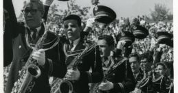 Marching band Library The library was filled with the lively of a marching band parade, as the snare drums kept a steady