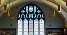 Interior of Coast Library featuring a vaulted ceiling, elegant stained glass, and students studying at wooden desks.