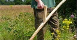 Scythe cut hay Library The of an antique scythe cutting through hay grass can transport you to a simpler time, when the