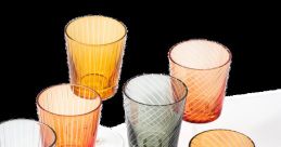 Drinking glasses Library The delicate clinking of glass meeting glass fills the air of the quiet library. The of