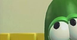 Larry the Cucumber looking concerned in a colorful room from "Where's God When I'm Scared?" reflects childhood fears and faith.