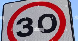 30 mph speed limit sign indicating the end of the zone, essential for traffic control near the library area.