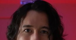 Markiplier with tousled hair and excited expression, set against a vibrant red and blue background.