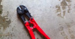 Bolt cutter Library The of a bolt cutter in action is both powerful and intense. The sharp, metallic snap of the blades