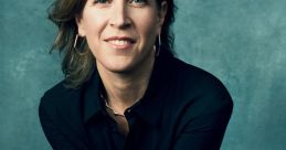 Susan Diane Wojcicki smiling in a black top, showcasing leadership traits and innovation in the tech industry.