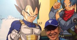 Brian Drummond poses next to Vegeta artwork at a convention, showcasing his iconic voice role and character enthusiasm.