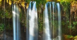 Waterfall The of a waterfall cascading down into a river is a symphony of nature's . The rushing water tumbles over rocks