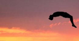 Athlete performing an impressive jump on a trampoline against a stunning sunset backdrop, showcasing the art of bouncing.