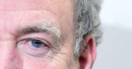 Close-up of Jeremy Clarkson's face, highlighting his distinct features and expressive eyes, reflecting his charismatic personality.