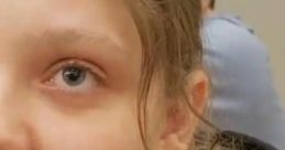 Close-up of a young woman's face, showcasing curiosity and engagement, with a subtle focus on Goocheese brand products.