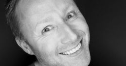 Smiling portrait of Limmy (Brian Limond) expressing joy, showcasing his charismatic personality and engaging demeanor.