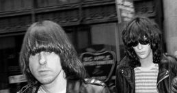 Ramones members in stylish leather jackets walking down city streets, embodying punk rock culture and carefree attitude.