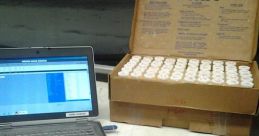 Testing equipment setup with laptop, measuring cylinder, and sample containers for Manfred Lehmann's 350 project.