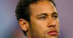 Neymar focused and ready, wearing a Barcelona jersey, showcasing his determination before a match.