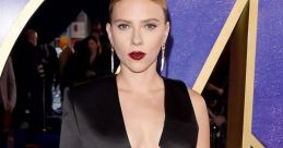 Scarlett Johansson stuns at a Hollywood event in a chic black outfit, showcasing her elegant style and bold makeup.