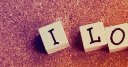 Corkboard background with letter tiles spelling "I Love You," conveying a heartfelt message of love and affection.