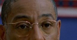 Gus Fring's intense expression in a yellow shirt captures his calm yet menacing persona in the crime genre.