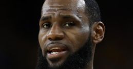 LeBron James passionately speaking during a Cleveland Cavaliers game, showcasing his intensity and leadership on the court.