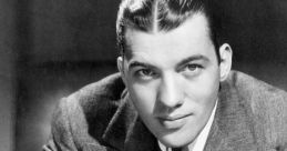 Classic black and white portrait of Ed Sullivan in a tailored suit, showcasing his charismatic smile and stylish hairstyle.