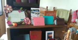 Colorful handcrafted leather goods and accessories from RaffyTaffy displayed creatively in a rustic setting.