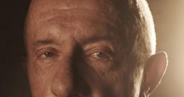 Close-up of Mike Ehrmantraut, showcasing a stern expression, highlighting his authoritative presence and character depth.