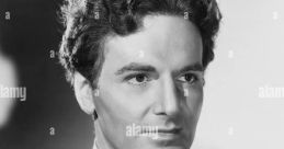 Classic portrait of John Sutton in an ornate costume, showcasing his distinct features and elegant style from the film era.