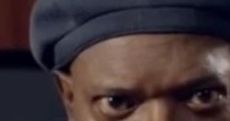 Samuel L. Jackson displaying intense anger, showcasing his iconic dramatic expression and distinctive beret style.