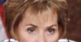 Judge Judy displays an intense expression while presiding in court, showcasing her authoritative demeanor and determination.