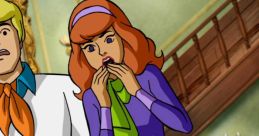 Velma and Fred express surprise as they investigate a spooky mystery in a haunted house, iconic moment from Scooby-Doo series.