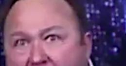 Alex Jones passionately expressing his views on a live broadcast, showcasing his intense and controversial personality.