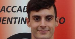 Giovanni Andreucci, wearing a red and white striped jersey, representing Cluentina Calcio.